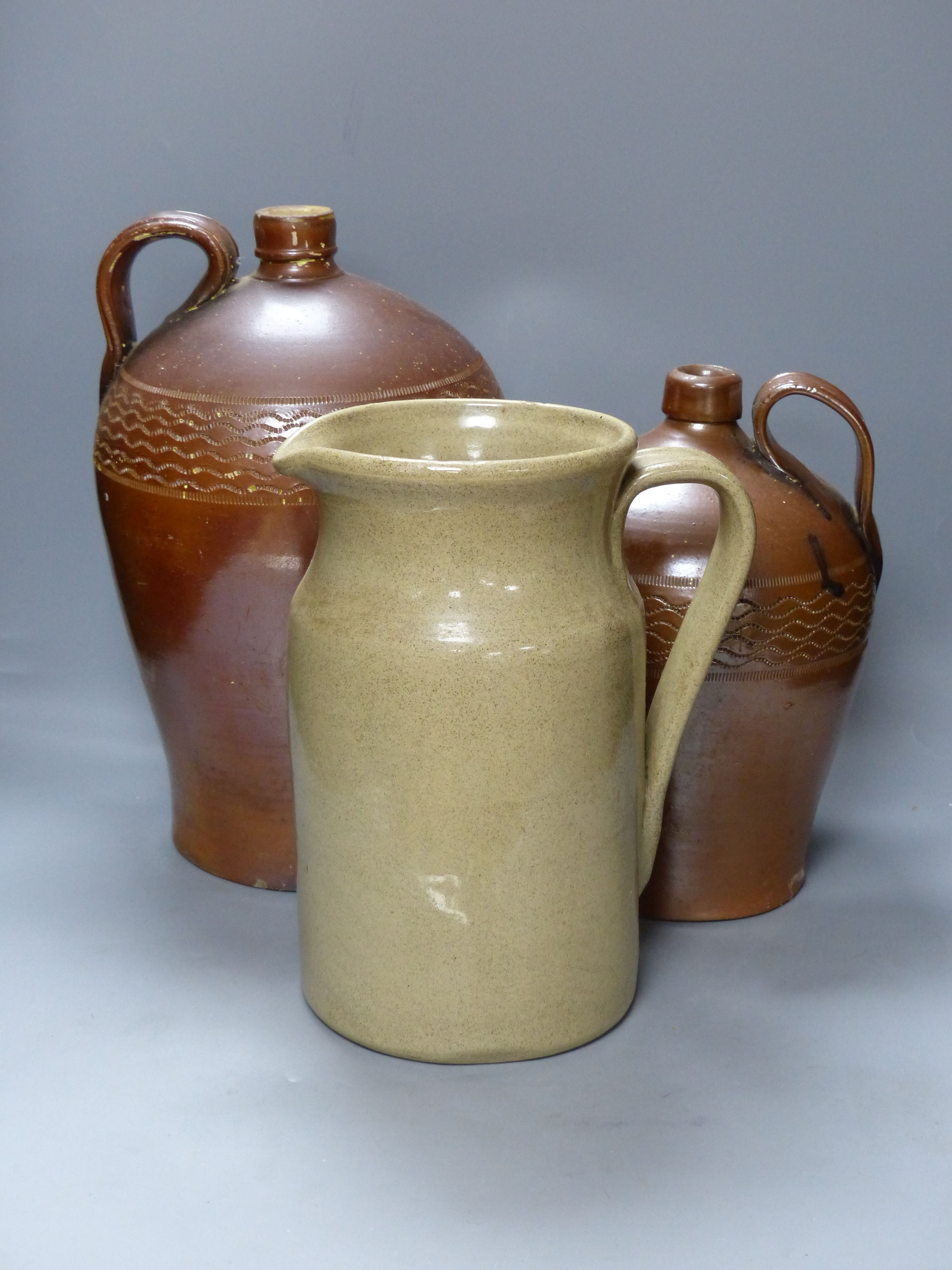 Two Victorian flagons and a jug (3)